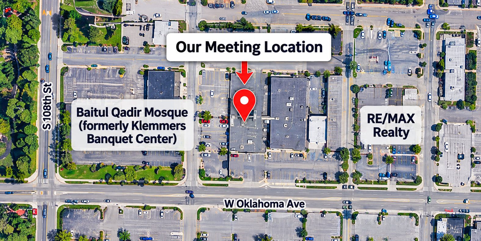 Aerial map showing the meeting building on W Oklahoma Ave between Baitul Qadir Mosque and RE/MAX Realty, east of S 108th St
